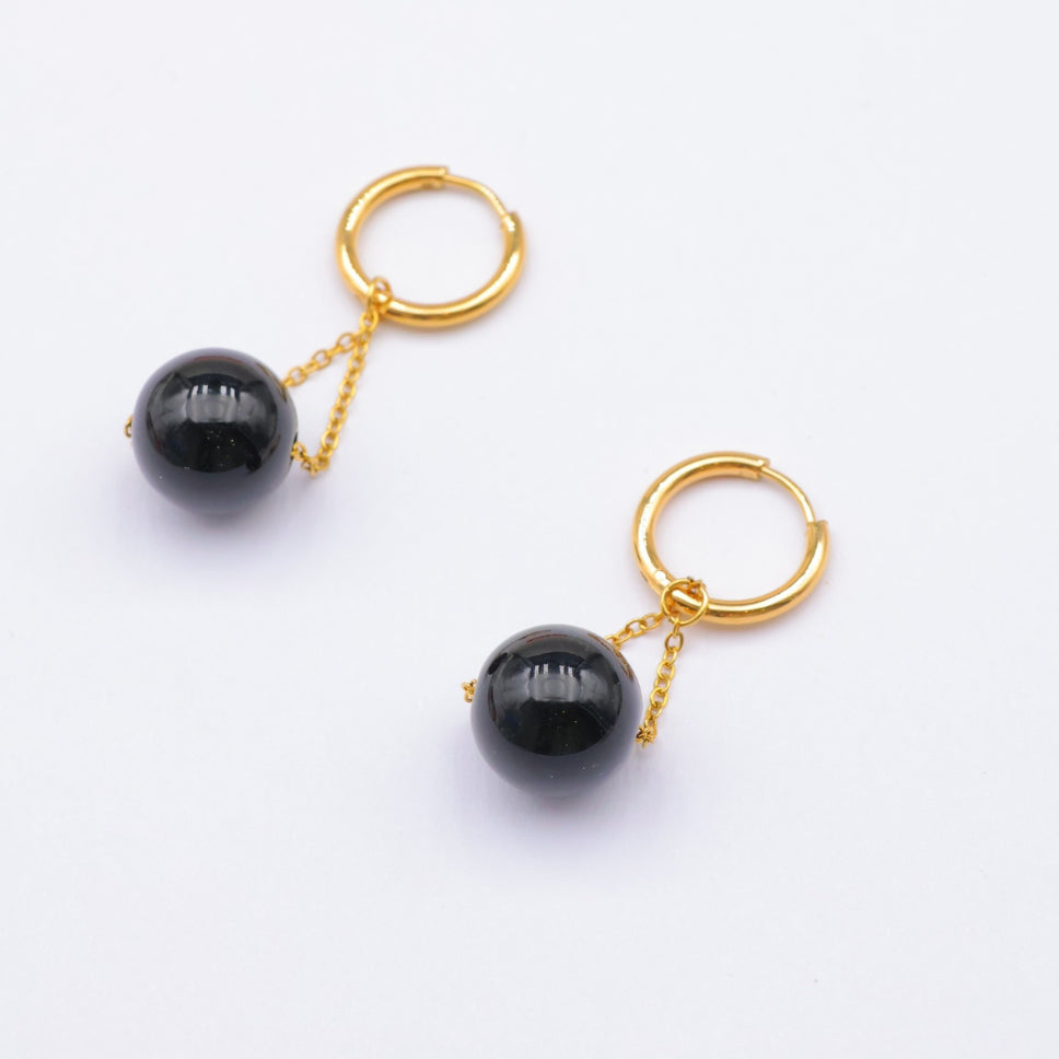 Boucles d’oreilles créoles noires – Lunoir, perle noire doré | Mitsury